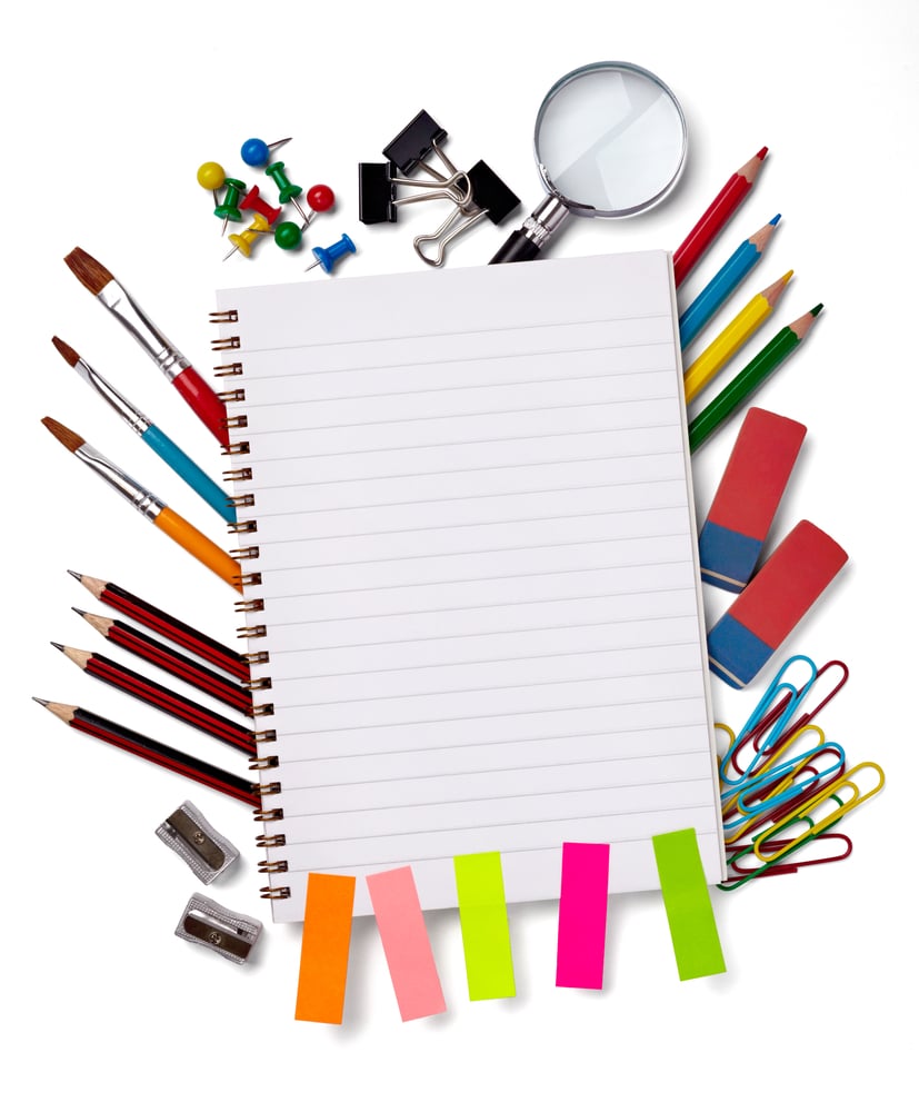 close up of various school items
